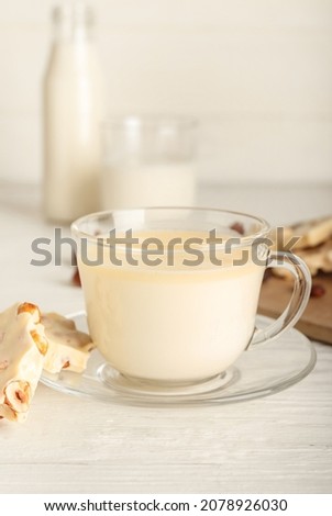 Similar – Image, Stock Photo Cups of tasty hot coffee drink on wooden table