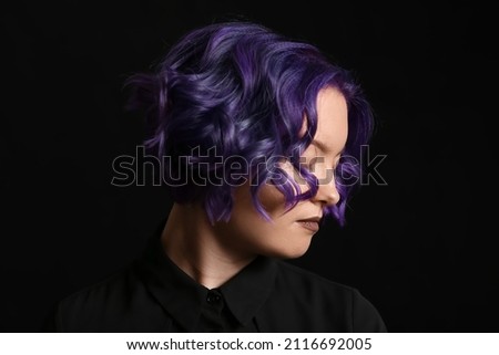 Image, Stock Photo Woman with purple hair leaning on metal fence and looking away