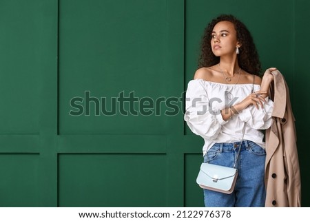 Similar – Image, Stock Photo woman wearing an elegant green dress is smiling into camera