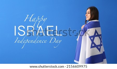 Beautiful woman with flag and text HAPPY ISRAEL INDEPENDENCE DAY on blue background Stok fotoğraf © 