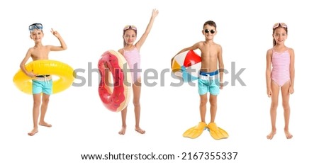 Similar – Image, Stock Photo Cute child with inflatable swimming ring and diving mask sitting on bed in hotel room. Playing, laughing, smiling. Happy family vacation.