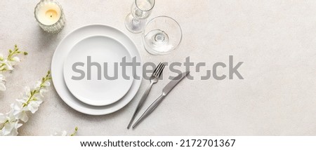 Similar – Image, Stock Photo Served banquet table with elegant decorations and plates with cutlery