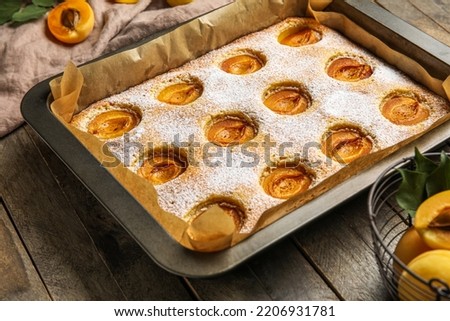 Similar – Image, Stock Photo Apricot pie in tray freshly baked. Top view of pie with a lattice crust