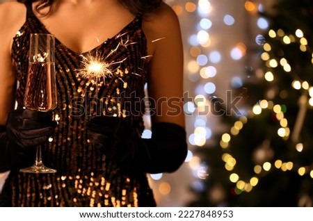 Similar – Image, Stock Photo Sparkler against blurred person in nature