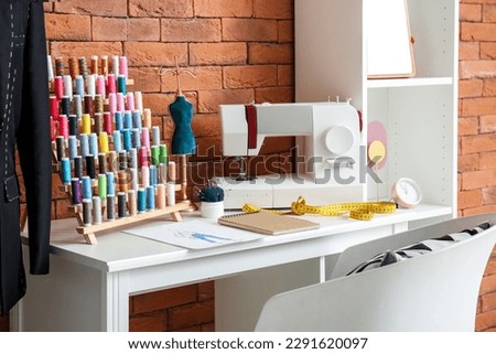 Similar – Image, Stock Photo Sewing threads in different colours in a box