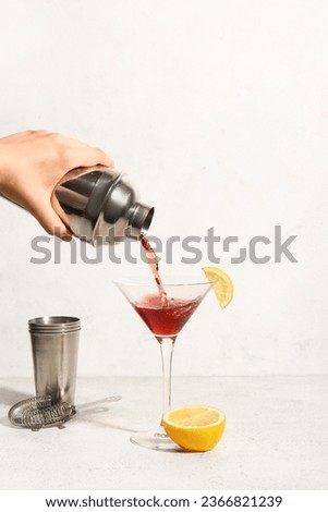 Similar – Image, Stock Photo Glass of Cosmopolitan refreshing cocktail on table