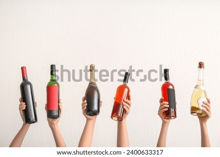 Similar – Image, Stock Photo Female with bottle of elderflower syrup