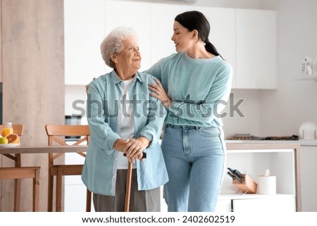 Similar – Image, Stock Photo Woman visiting her grandmother in isolation during a coronavirus pandemic