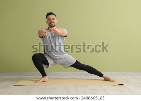 Similar – Image, Stock Photo Man doing yoga by the beach