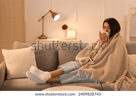 Similar – Image, Stock Photo Woman sitting on frozen river and tying the shoelaces