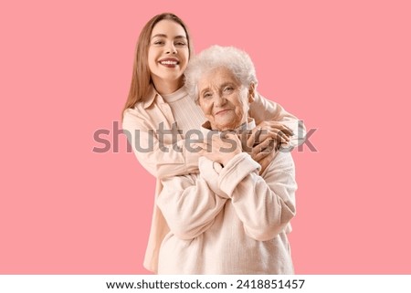 Similar – Image, Stock Photo Woman hugging her elderly mother