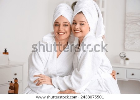 Similar – Image, Stock Photo Mother with her daughter at beach