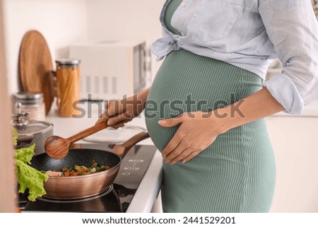 Similar – Image, Stock Photo young pregnant woman at home working on laptop. cute beagle dog besides