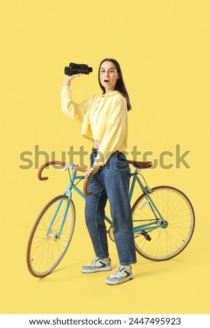 Similar – Image, Stock Photo Woman with bicycle seeks way on smartphone