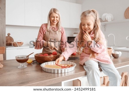 Similar – Image, Stock Photo Baking apple pie, recipe step by step. Making of an apple tart isolated on green background