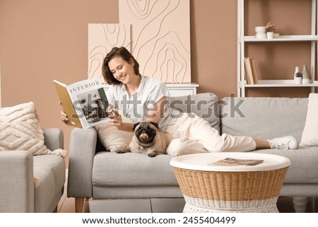 Similar – Image, Stock Photo Gentle woman relaxing in cozy armchair at home