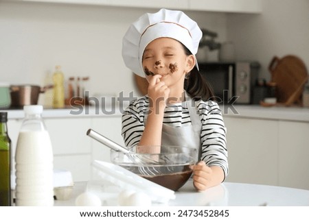 Similar – Image, Stock Photo Little girl with dirty and sad face. She is going to burst out crying that her favourite food is over