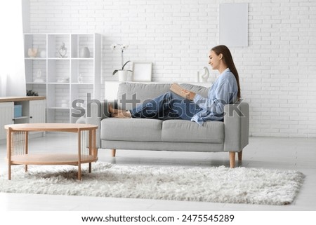 Similar – Image, Stock Photo Stylish female resting on seashore