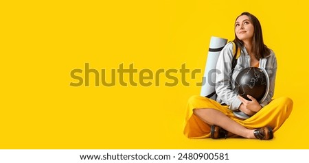 Similar – Image, Stock Photo Thoughtful young female tourist standing on rocky seashore and looking away