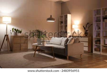 Similar – Image, Stock Photo Evening light illuminates an old red wall with a green door