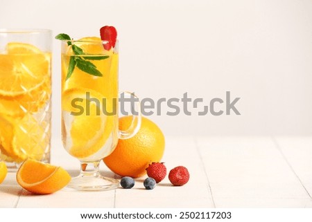 Similar – Image, Stock Photo Glasses of fresh infused water on table