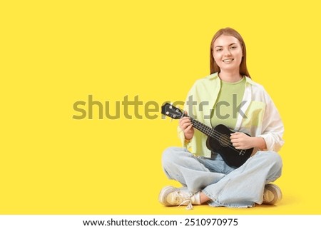 Image, Stock Photo young woman playing ukulele