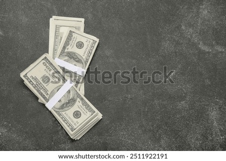 Image, Stock Photo Dollar banknotes on a wooden table