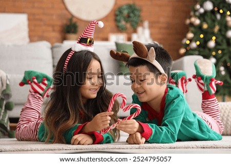 Similar – Image, Stock Photo portrait adorable child eating chocolate sponge cake