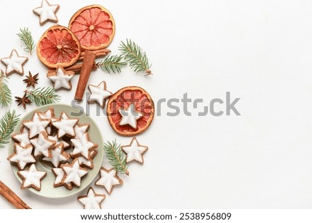 Similar – Image, Stock Photo Delicious fir tree with white chocolate, sugar pearls and red jam on dark plate in moody style