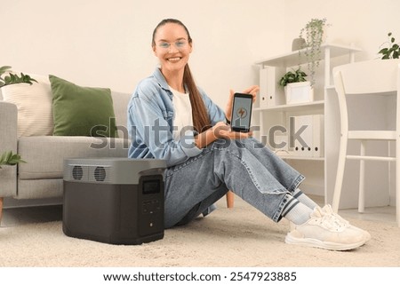 Similar – Image, Stock Photo woman charging batteries in the middle of nature