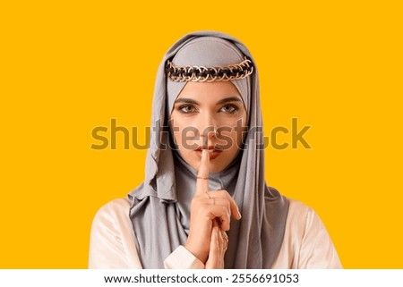 Similar – Image, Stock Photo Ethnic woman showing silence gesture in field