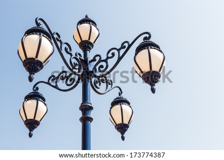 the street lamp and blue sky with blank area at right side