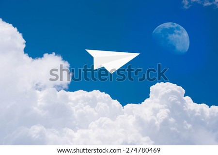 Paper airplanes in blue sky to the moon