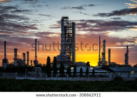 silhouette of petrochemical industrial plant in sunrise