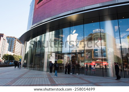 Beijing, China - Oct 10, 2013 : Unidentified people is standing infront of Apple store Wangfujing street branch to wait the store open at Wangfujing street, Beijing, China.