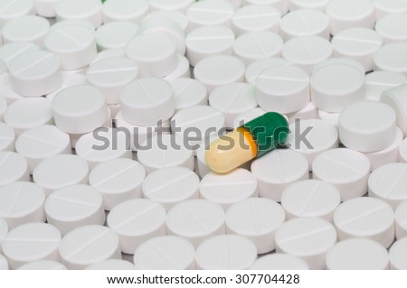 White pills paracetamol paceblo tablets and one pill capsule
