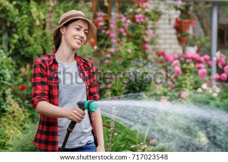 Similar – Image, Stock Photo Woman with water hose