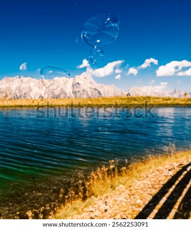 Similar – Image, Stock Photo Soap bubbles over the port of Hamburg