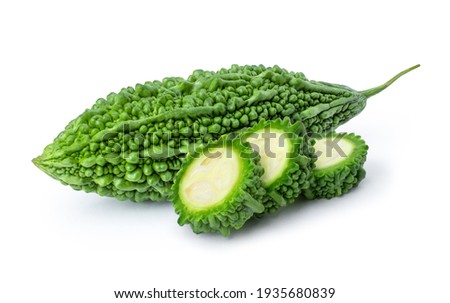 Closeup fresh bitter gourd ( bitter cucumber, Momordica Charantia or bitter melon ) with cut slice isolated on white background.  Foto stock © 