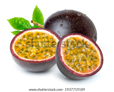 Passion fruit (Maracuya Passiflora) with green leaf and cut in half slice isolated on white background.  