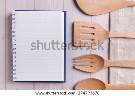 blank book wood cookware on wood slat