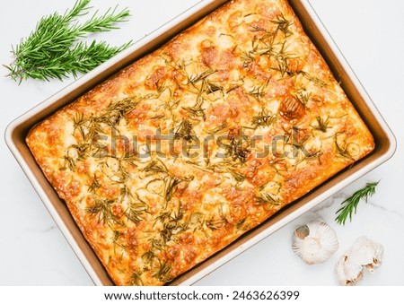 Similar – Foto Bild Hausgemachtes Rosmarin-Focaccia-Brot, Ansicht von oben, Nahaufnahme.