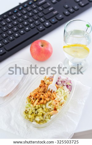 Healthy eating for lunch to work. Food in the office. Chicken salad.
