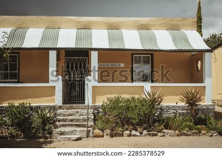 Similar – Image, Stock Photo an old fashioned canopy and its shadow, black and white