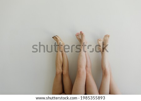 Similar – Image, Stock Photo Smiling overweight ethnic sportswoman against fence and sea