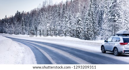 Similar – Foto Bild Verschneite Straße an einem sonnigen Tag im Winter