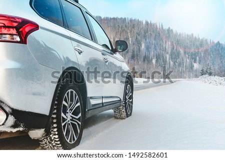 Similar – Foto Bild Verschneite Straße an einem sonnigen Tag im Winter