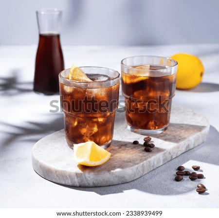 Similar – Image, Stock Photo Coffee cocktail with lemon in restaurant