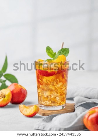 Similar – Image, Stock Photo A refreshing drink is served, with cream and chocolate powder, over a wooden table. There is also a straw for the rest in the glass.