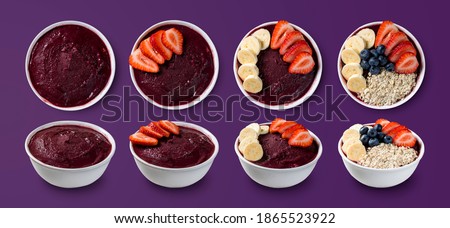 set of many Brazilian frozen açai berry ice cream bowls with diferent ingredients on a purple summer background. top view and front view for menu
